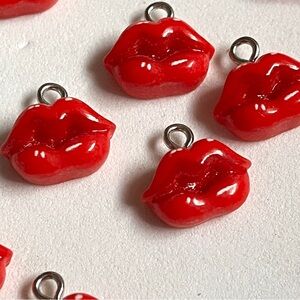 20 Red Lip-Shaped Charms. Metal & Cast Forms.